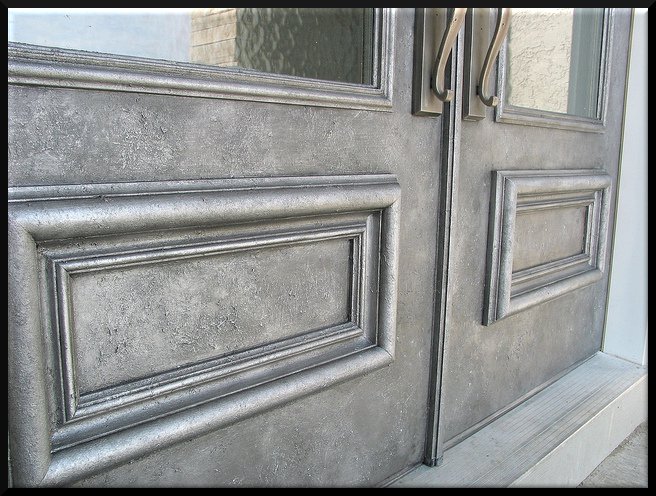 Our clients chose to make their fiberglass doors look like iron. 